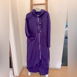 hooded sweatshirt maxi jacket, duster with zip and flap details. Split bottom.